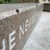 Grind To A Halt Hemisphere Grinder Minders installed on an outdoor granite planter.