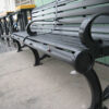 Grind To A Halt Round Bolt-On GrinderMinders installed on an outdoor bench.